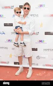 Dan Abrams and Everett Floyd Abrams attend The Children's Museum of the  East End's 6th Annual Family Fair in Bridgehampton