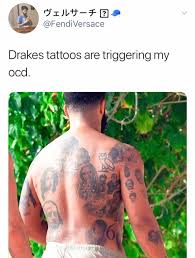 Most of his tattoos have been inked on his big muscular arms which have different meanings. Drake Trolled For His Ugly Back Tattoo Collection Blacgoss