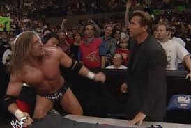 Image result for schwarzenegger wwe triple h