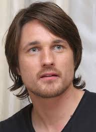 Virgin River star looks unrecognisable in throwback snaps from 20 years ago 