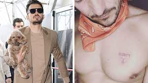 Orlando bloom is known to have two tattoos on his body; Orlando Bloom Gets Tattoo Over Heart After Search For Beloved Dog Mighty Bbc News