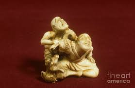 A very good study of kwanju reading at a low table. Japanese Netsuke In Ivory 19th Century Photograph By Science Photo Library