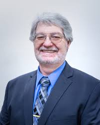 took this photo of a fire and the first thing i saw was a guy (or girl lol)  with their arms up, it kinda looks like they are waving for help. but