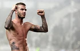 His beefy physique is adorned by numerous tattoo designs ranging from religious to personal expressions of love and admiration. David Beckham S Tattoo Timeline A History Of Body Art Mirror Online