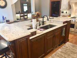 We did not find results for: Origami White Cabinets With Red Brown Glaze Island Is Cherry With Fruitwood Stain Van Dyke Brown Glaze The Hood Is A Scagliola Stone In A French Cream Color Quartz Premier Cabinetry