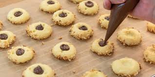Nutella Kulleraugen Rezept Von Backen De Rezept Platzchen Rezept Einfach Nutella Lebensmittel Essen