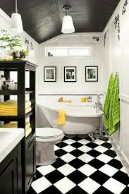 Great Use Of A Small Bathroom Love The Black And White Tile The Small Slipper Bath And Dash Of White Bathroom Tiles Small Bath Design White Bathroom Designs