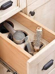 The storage suspends the tool carry it in a caddy. Creative Hair Dryer And Curling Iron Storage Ideas Hative