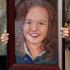 A picture might be worth a thousand words, but for two Utah families, a  portrait they received today left them speechless. Darin Hoover was amazed  at how realistic his son looked. Marine