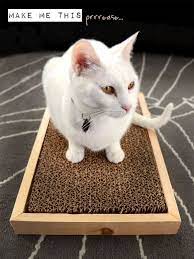 And This Scratcher Will Give Your Cat S Nails A Workout Diy Cat Scratcher Diy Cat Scratching Post Cat Diy