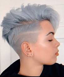 This classy updo doesn't necessitate shortening the sides in order to give your hair the mohawk shape. Mohawk Hairstyle For Girls Mohawk Hairstyles Short Hair Styles Tomboy Hairstyles