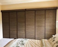 Woven Wood Sliding Panels With A Blackout Liner Is A Popular Choice To Create A Natural Fresh Look Custom Window Treatments Sliding Panels Beautiful Bedrooms
