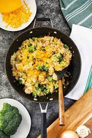 Cook everything together on the stove, add sharp cheddar cheese, and finish off in the oven to melt the cheese. One Pot Chicken Broccoli And Rice