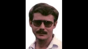 Convicted killer charged in 1982 slaying