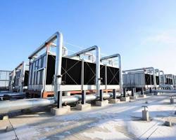 massive data center exterior with cooling towers and water infrastructure, AI generated