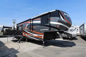 In the rear garage reloading bench mounts to rv wall with brackets dave explains: 2019 Heartland Road Warrior 427 Montclair P1442 Giant Rv