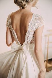 Romantic Wedding Dress Idea Deep V Back Wedding Dress With Lace Details And Big Bow Dress By Mi Wedding Dresses Romantic Wedding Dresses Lace Big Bow Dress
