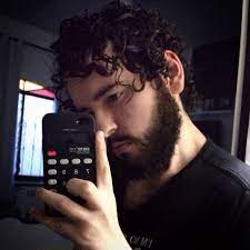Going Strong On The Awkward Phase Towards Long Curls Curly Hair Men Curl Power Curly Hair Men Long Curls Mens Hairstyles