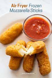 While the oil is heating, beat both eggs in a bowl. Air Fryer Mozzarella Sticks From Frozen Cheese Sticks Air Fryer World