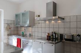 We are thinking about painting our white cabinets to a grey color, like in the picture below. Ferienwohnung Im Sternenhof Ferienwohnung Im Sternenhof