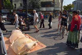 Nude Protester Poses Next to 'Turkey Carcasses' | PETA