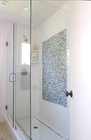 Beach Cottage Great Combination Of Mosaic Tiles With A More Affordable White Subway Tiles Glamorous Bathroom Decor Bathroom Inspiration Modern Bathroom Tile