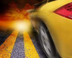 Yellow Sport Car Driving To Sunset A Yellow Car Is Driving On A Road With A Zoo Aff Sunset Yellow Car Driving Yellow Yellow Car Car Sports Cars