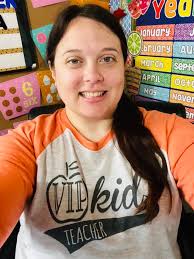 Crazy day care teachers at 6 am. Don't mind us. Favorite shirt day.