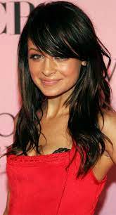 Just 24 hours after debuting her newly dyed blue hair, she had a change of heart and was back to her favored lilac look. Nicole Richie Hairstyles Hair On The Brain Hair Styles Long Dark Hair Long Hair With Bangs