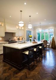 Above is a remodeled kitchen done in mostly white with natural light wood floors and wood island surface. White Cabinets And Dark Wood Floors Novocom Top