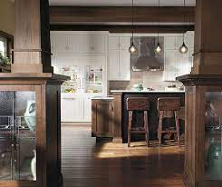 Dog gates retract into the island and when extended the keep the dogs from the rest of the house. Quartersawn Oak Cabinets In Rustic Kitchen Decora