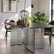 An extendable dining table is a great choice if you're both entertaining large parties and eating at the table with a smaller crowd. Fiam Italia Curved Glass Furniture That S Classy