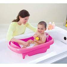 Adjusts as baby grows, from newborn to toddler. The First Years Sure Comfort Newborn To Toddler Baby Bath Tub Pink Walmart Com Toddler Bath Tub Bathing Newborn Baby Bath Tub