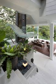 En nk reformas le cambiamos sus puertas en 48h. Open Spaces Combined With Smart Private Zones At The Be Landa House Decoist In 2020 Asian House Dream Home Design Modern House Design