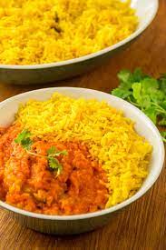 Carefully pour chicken broth into dish. Yellow Rice Vegan On Board