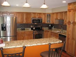 Cute colorful kitchen white background and colorful but very few things. Small Kitchen Renovation Designs