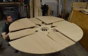When the table expands, four additional leaves move up from beneath with the help of a linear bearing made of wood and a roller that slides along the base it doesn't really fit, there have to be small gaps between the outer ring and the inner non circular table because the ring rotates. Expanding Circular Table Hardware 16 Best Fascination Expanding Circular Tables Images On Expanding Circular Dining Table In Burr Ash Aimy Nintendo