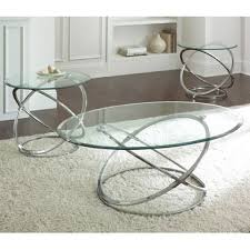 Clear/silver medium round glass coffee table set with metal rings base. Pin On Muebles