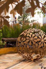 Metal Wall Sculptures By Entanglements Flower Ball Metal Artwork In A Wrought Iron Like Finis Metal Sculptures Garden Metal Garden Art Garden Art Sculptures