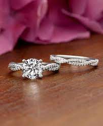 Both Rings In This Beautiful Matched Set Feature Entwined Strands Of Scalloped Pave Diamonds Http Www Wedding Rings Engagement Engagement Engagement Rings