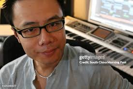 Music producer Johnny Yim Lai-hang, pictured at his home in Tai Hang...  News Photo