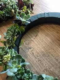 After designing your succulent arrangement, open a small hole in the wreath by using scissors or a screwdriver. Diy Succulent Wreath Learn How To Make A Beautiful Living Wreath Style Curator