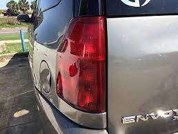 Image result for Red 2003 Envoy