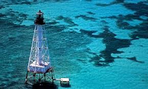 Alligator reef lighthouse was established in 1873 and last seen in operation in 2014. Alligator Reef Lighthouse Photograph By Skip Willits