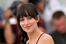 Dakota Johnson Nearly Has a Wardrobe Malfunction