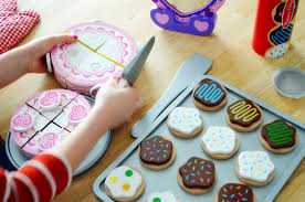 The melissa & doug slice and bake cookie set makes an ideal gift for kids bought this as a christmas present for a 2 year boy, as he really enjoys imaginative play. Woman In Real Life Enjoying Our Toys