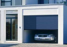 The Rollmatic Garage Door From Hormann Provides Plenty Of Space In Front Of And Inside The Garage You Can Drive Directly Up To Porte Garage Facade Maison Door