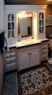 A tiled vanity gives your bathroom a designer look without completely redesigning the whole room. Bathroom Vanity Tile Top Upper Cabinet Storage Special Molding Creative Cabinetry Inc