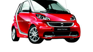 The smart's base trim is dubbed pure, but it might better be called spartan because this model is so lacking in creature comforts most of us now take for granted in a new car. 2013 Smart Fortwo Fresh Styling New Electric Drive Model