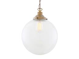 The clear globe features longitudinal ridges along its surface. Riad Clear Globe Pendant Light 30cm By Mullan Lighting